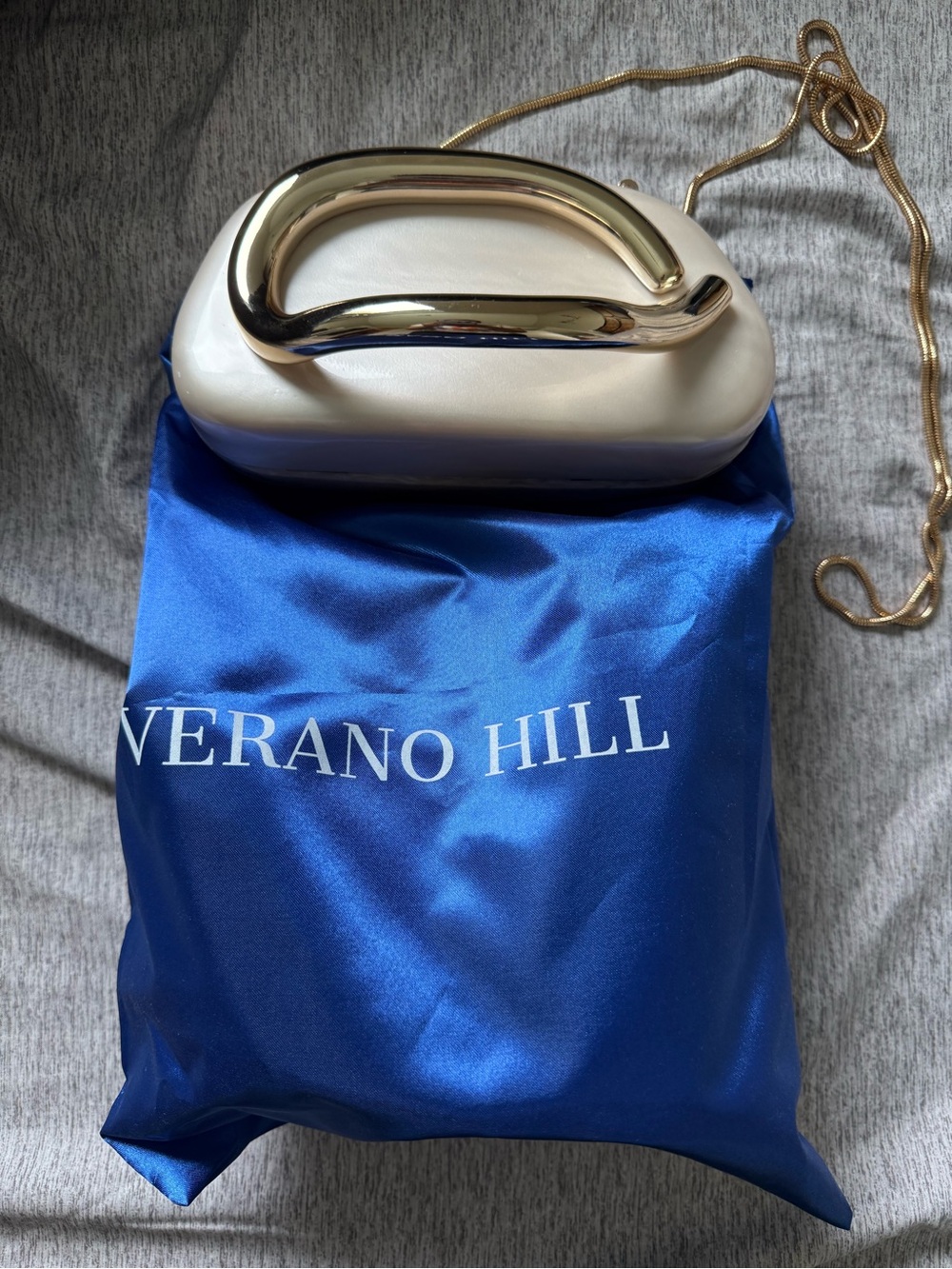 Verano Hill Ivory Clutch with Gold Handle